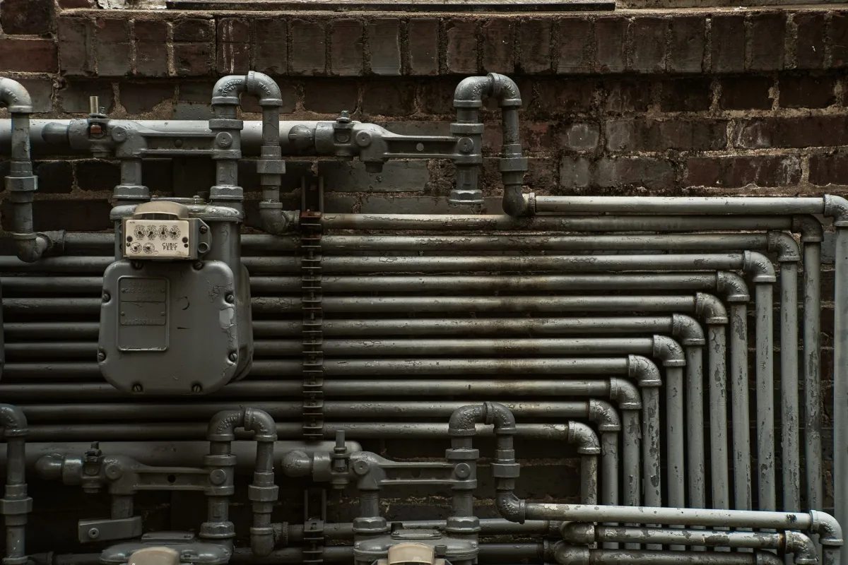 House drain pipes joining a main line that runs to the septic tank