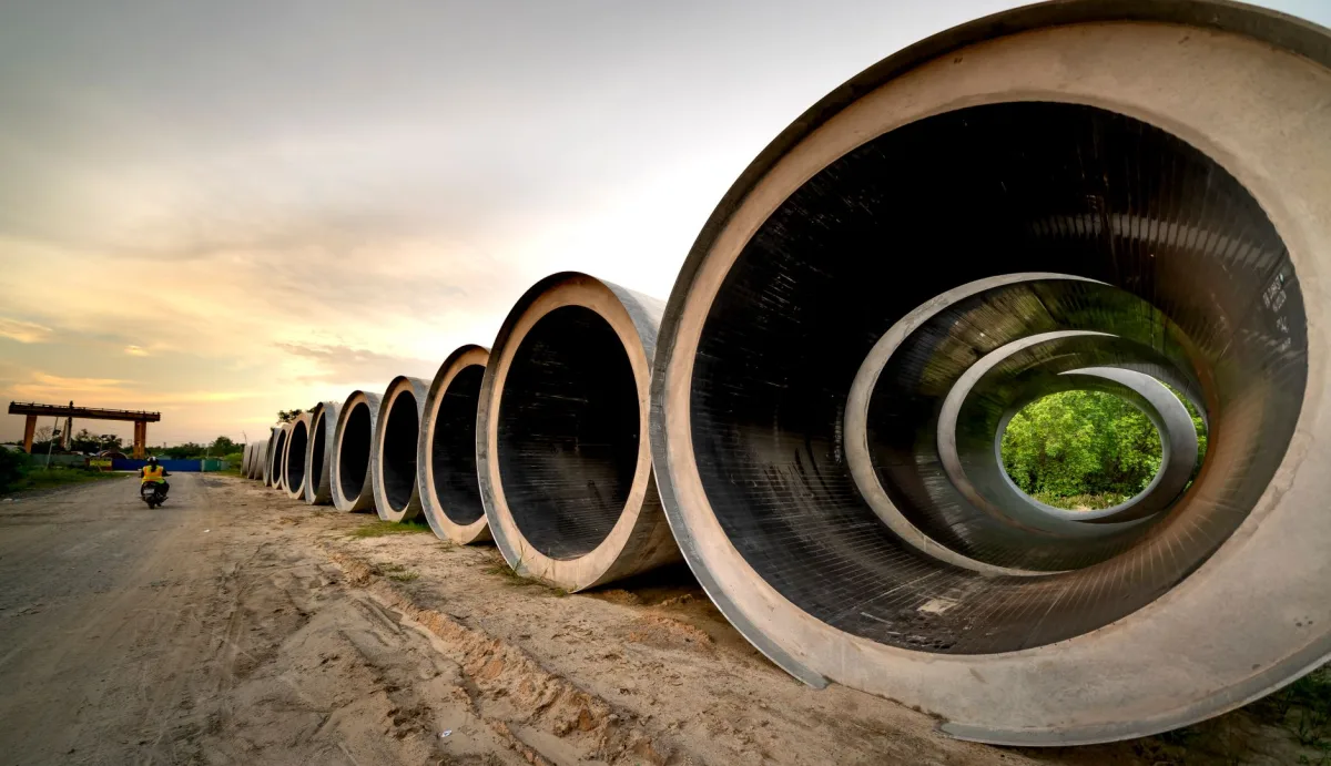 Gravel trenches and perforated pipe of a septic drain field during installation