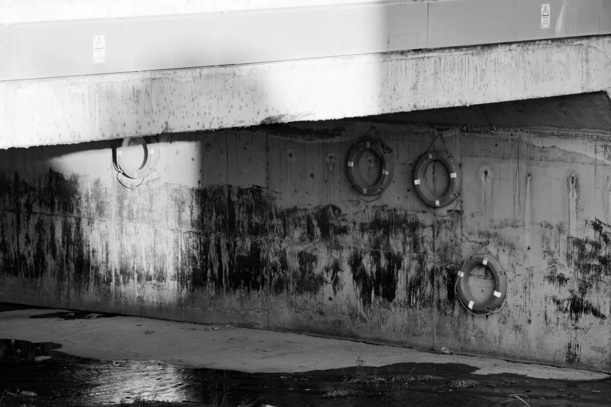Stacked perforated concrete rings used to build a seepage pit chamber