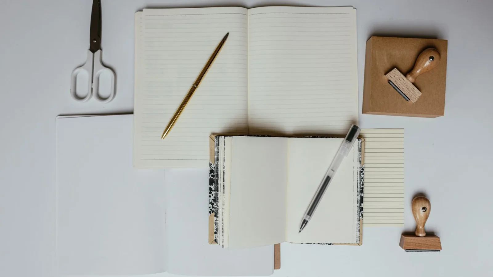 Homeowner writing septic service details in a maintenance record notebook