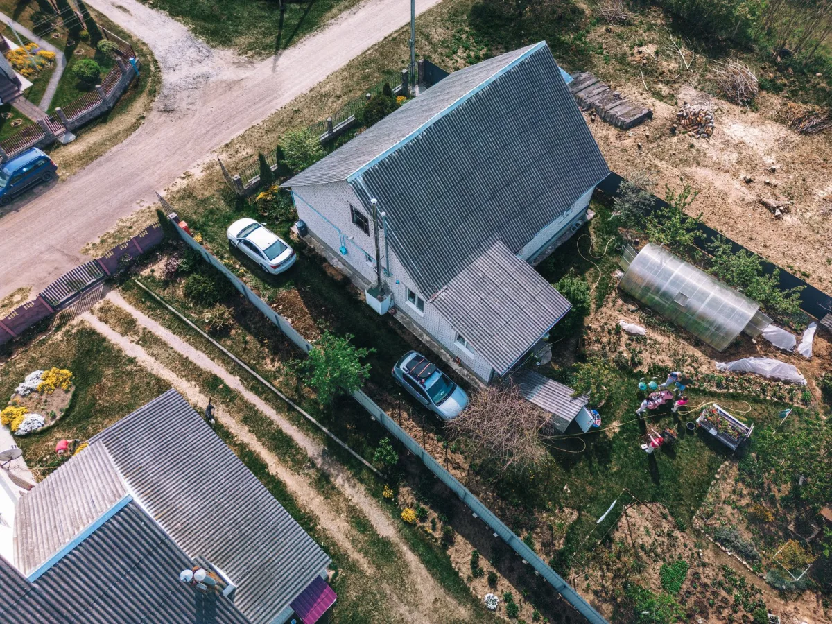 Green septic tank lid in a backyard lawn