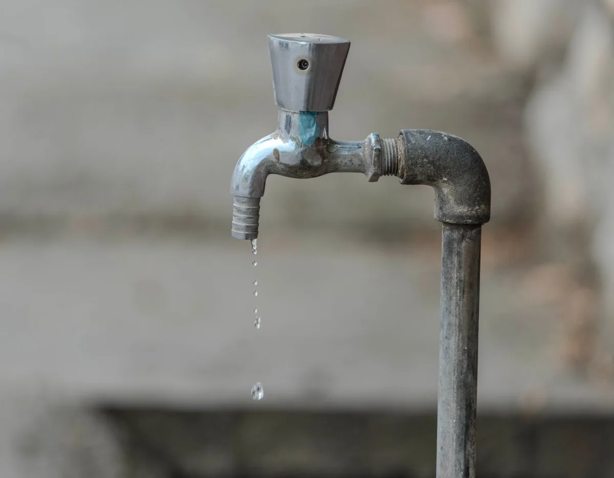 Close-up of a household water and sewer utility bill on a table