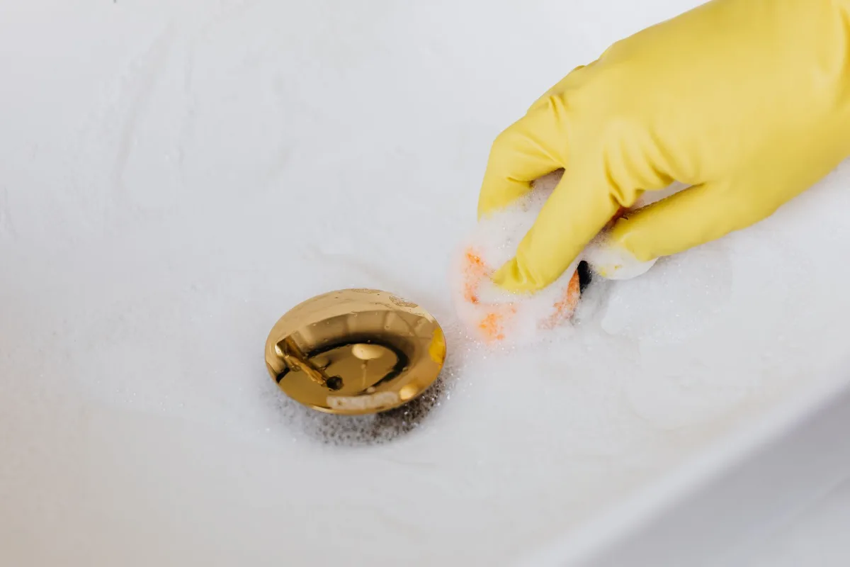 Water draining slowly in a bathroom sink as an early septic warning sign