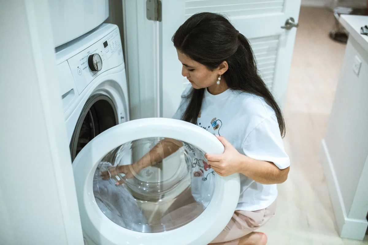 Home washing machine mid cycle in a laundry room